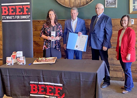 Gov. Jim Pillen (second from left) holds a proclamation naming May as ‘Beef Month’ in Nebraska. He was joined at the proclamation signing ceremony at the Single Barrel restaurant in Lincoln by (from left) Nebraska Beef Council board chairwoman Rosemary Anderson, Nebraska Cattlemen president Dick Pierce and Nebraska Department of Agriculture Director Sherry Vinton. 