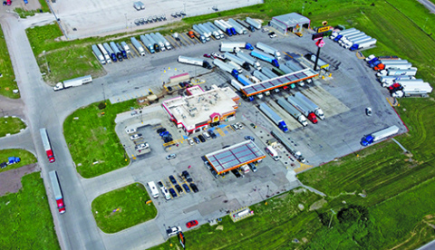 Love’s Travel Stops, which planted a flag in Aurora with a new facility at Aurora’s I-80 interchange back in 2003, is abuzz with truck activity on Saturday morning. Traffic studies have shown that an average of 25,472 vehicles pass by on the interstate every day of the year, which has been a motivating factor for businesses considering the Aurora interchange.