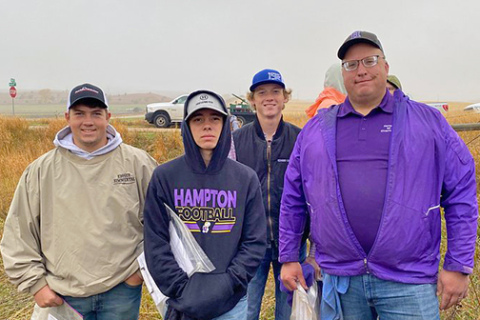 Hampton ag teacher Joel Miller (right) poses for a picture with some of his students at a recent land judging competition. Miller has served as the state coordinator for land judging since 2016. 