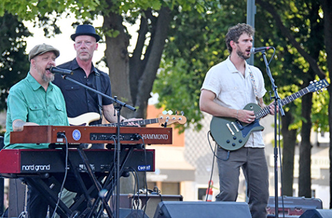 Josh Hoyer & Soul Colossal gave the final performance of the season at Bands on the Bricks on Friday. From left are Hoyer, bass player Mike Keeling and on guitar, Aurora grad Myles Jasnowski.