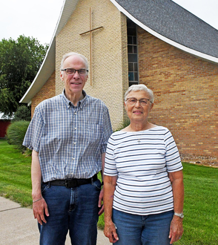 St. Peter’s Lutheran Church Pastor Dan Barbey and long-time church member Kathy Johnson stand outside the church building on H Street in Hampton. The church will hold its last Sunday morning worship service on Sept. 7. 