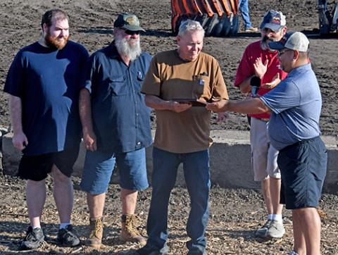 Three generations of the Marsh family were on hand to receive the Arsarben Pioneer Farm award presented by Hamilton County Ag Society president Justin Hermanson (right). From left are Matthew Marsh, his father Gayle (who currently operates the farm) and Gayle’s father, Ivan. Also pictured (back right) is Ag Society board member Jeremy Brandt. 