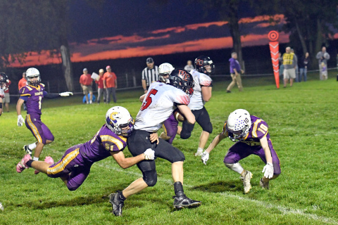 Hampton's Kyler Rojewski makes a diving save with an assist from Mason Wiens. 