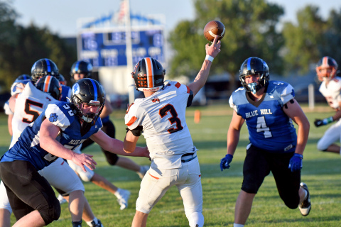 Giltner QB Brody Rudy throws a pass from his goal line during an 82-6 loss to Blue Hill Friday. 