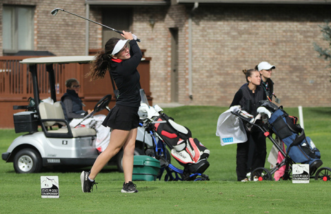 Aurora senior Julia Messere tees off at the Scottsbluff Country Club, where she won the gold medal a posting a two-day score of 162.