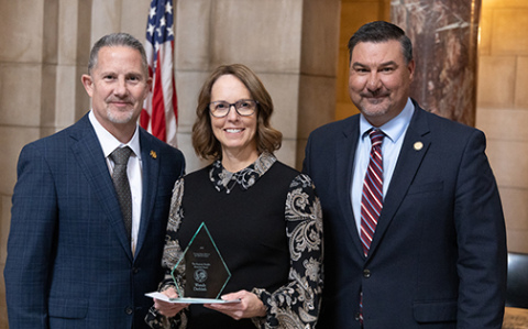Hamilton County District Court Clerk Wendy Dethlefs (center) was presented with the  Marjorie Schaffer Memorial Award for Outstanding Clerk of the District Court for 2025 at a ceremony in Lincoln on Tuesday, Oct. 28. Pictured with her are Supreme Court Chief Justice Jeffrey Funke (left) and State Court Administrator Corey Steel. 