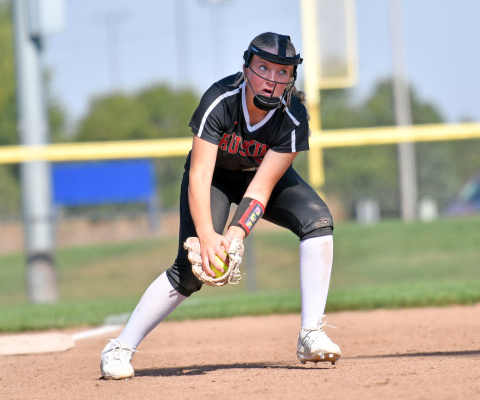 Kierra Siebrass fields a grounder at third and eyes the throw down to first in Aurora's 6-2 win over York Thursday. 