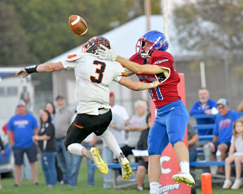Giltner's Brody Rudy breaks up a potential TD pass to HPC's Brodey Spurling during Friday's area rivalry game the Storm won, 80-34.