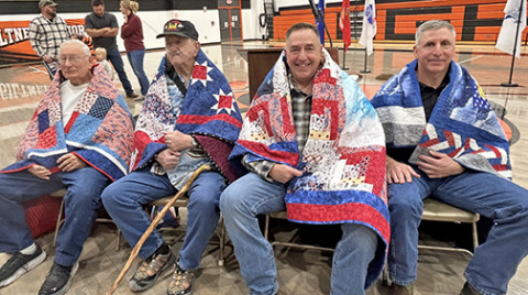 These veterans were each honored with a quilt of valor during Giltner Public Schools’ Veterans Day program on Tuesday, Nov. 11. Pictured from left are Robert "Jody" LaBrie, Thomas Lambert, Chris Most and Daniel Most. 