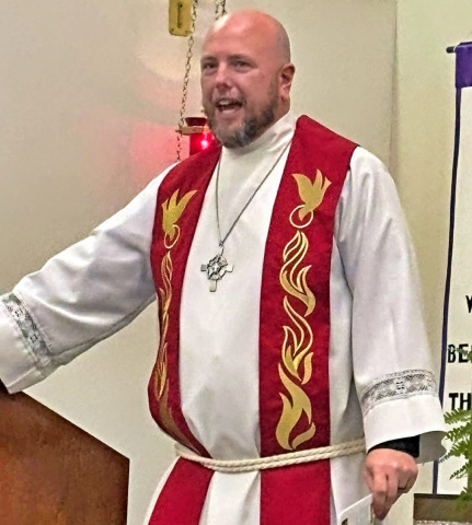 Pastor Tim Wells of Cross of Christ Lutheran Church in Aurora leads a special worship service on Sunday, Oct. 26 to celebrate the church’s 15th anniversary as a congregation of the Lutheran Church Missouri Synod. Wells celebrated his 10th anniversary as pastor in July. 