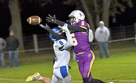 Brayden Wolinski fights through contact to try and haul in a pass. 