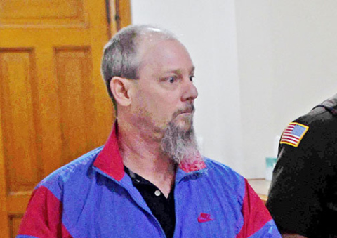 Jeffrey Adams is escorted back to jail on one of the days of his June 2024 trial. 