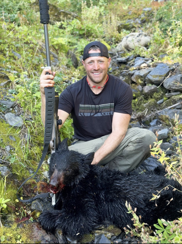 Matt Griess is all smiles after taking this 150-pound black bear while on a memorable hunt with two friends in the Mt. Baker Wilderness area of northern Washington state.