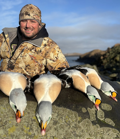 Zack Tesar displays four king eider sea ducks, which he harvested on a January trip to St. Paul Island, located in the Bering Sea 300 miles off the coast of Alaska. This photo was picked as the grand prize winner in the ANR’s Super Shot Contest.