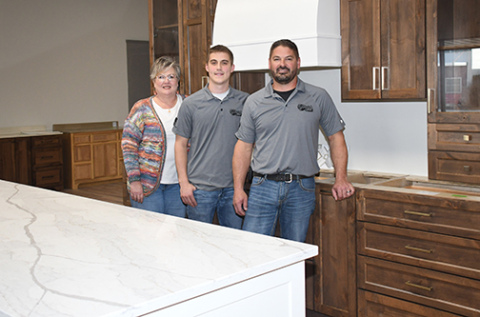 Pictured from left in Danish Oak’s new showroom are Shauna Pursley, Drake Schafer and Dane Schafer. The Hampton business celebrated its 20th anniversary last year and recently expanded next door into the former Smith True Value Hardware Store.