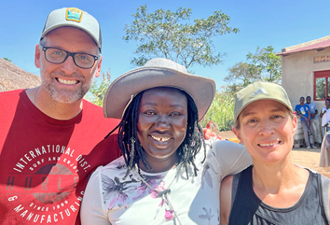 Ryan and Jen Ramaekers of Aurora pose for a picture in Uganda with Filda Lakite, Fig Tree and Vine vice president, who is leading the nonprofit in country. 
