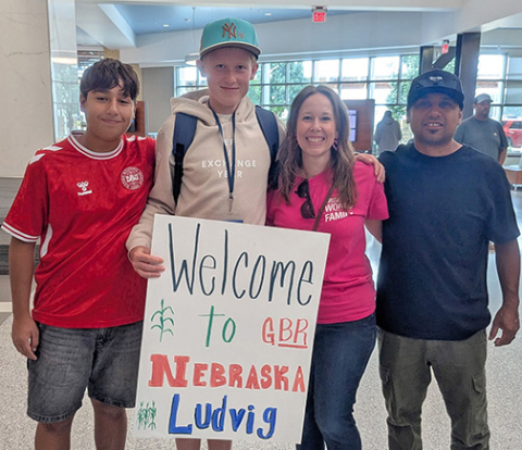 The Diaz family of Aurora greets Danish exchange student Ludvig Bjerring (second from left) as he arrives in Nebraska for his exchange year. From left are Adrik Diaz, Bjerring and Sara and Dario Diaz. 