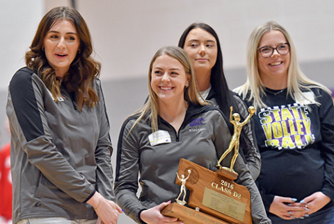 Hampton welcomed back former volleyball players and coaches from its state tournament qualifying and championship teams Friday night, honoring them in between H&H basketball games. Pictured above are members of Hampton’s 2016 state championship team, including from left: Madison (VanHousen) Reimers, Jacey Klassen, Tayler (Klassen) Nissen, Ashlynn (Arndt) Orr. 