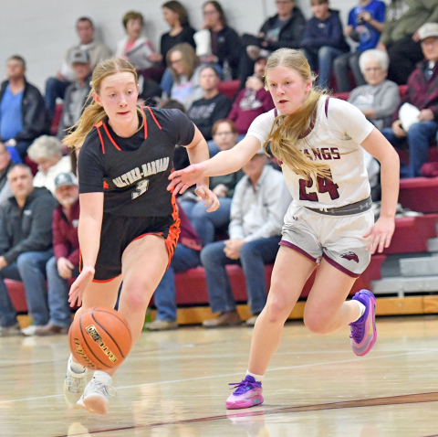 Avery Reeson looks for a lane during Giltner-Harvard's 46-35 loss to Silver Lake in Thursday's TVC semifinals. 
