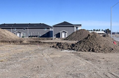 Holes in the ground reflect new single-family dwellings soon to be built along Highlander Lane in the new Streeter Subdivision.