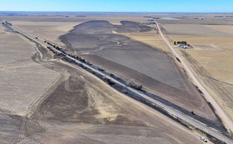 This drone photo shows the path of the fire that burned through nearly a mile of fields near Giltner on March 8. 