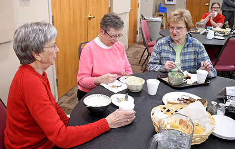 The Messiah Lutheran Church hosted the third annual Soup Bowl Fundraiser by the Hamilton County Backpack Program. Among the community members that attended the fundraiser lunch were. from left, Joann Dick, Karen Wilshusen and Glenna Markham.
