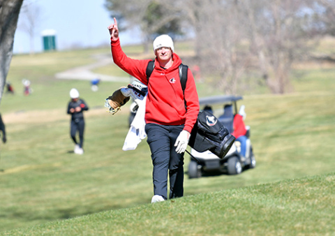 Cash Garrett shares a light-hearted moment with the camera while carding a round of 70 Friday to win his first high school golf tournament for the Huskies at the season-opening Seward Invite. Garrett’s round included 15 pars, two birdies and just one double-bogey. 