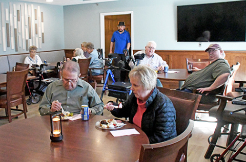 East Park Villa hosted its grand opening of the Grille Friday where residents and their guests could dine inside and enjoy music and arts brought together by East Park Villa’s employees. The Grille was constructed in EPV’s east dining room area.