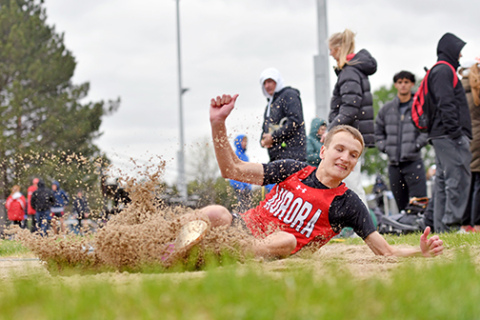 Jayden Slagle, pictured here during Monday’s CNTC competition, broke Aurora’s triple jump record at last week’s GINW Invite, leaping to a mark of 48-2. 