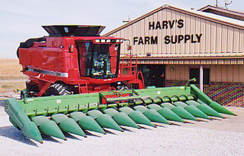   A Case IH 2388 combine with a John Deere 1293 corn head is shown outside the Bish Enterprises shop in this photo from the late 1990s to early 2000s. (Bish Enterprises photo)  