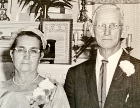 James Cavett Bierbower and his wife Margarett appear in a 1962 photo taken at the wedding of their son, John, at the old Catholic Church in Aurora. Just a few months later the Bierbowers would close the Giltner Gazette newspaper he had run for more than 50 years. (Photo courtesy of Mary Bierbower of Aurora at whose wedding the photo was taken.)
