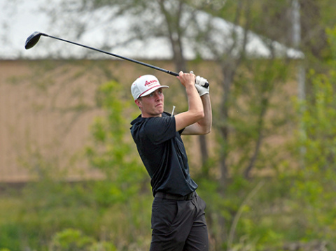 Ryan Staehr watches his tee shot from the opening hole at Schuyler Golf Club during Friday’s Central Conference round. Staehr finished with an 83, one stroke off the medal stand. 