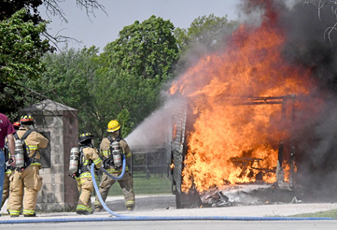 Fire completely destroyed this camper last week after smoke was discovered coming from inside as it was being pulled down the highway. 
