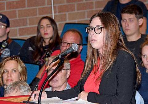 Amelia Guenther, local firefighters union president, was one of several asking questions during last week’s presentation by two private ambulance companies seeking a contract to provide services in Aurora and Hamilton County.