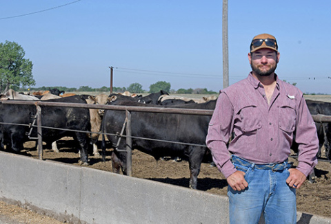 Local feedlot owner Preston Franzen stands near the feeding bunk of a pen of feeder calves at his Franzen Feeders yards near Stockham. As a former Western Nebraska ranch kid and now the president of the York-Hamilton County Cattlemen, he loves to talk about the challenges, opportunities and future of the beef industry. 