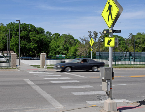 With the speed limit set at 35 mph on that stretch of Highway 34, Aurora Police Chief Paul Graham urges children and adults crossing the highway on the way to the Aurora Aquatic Center this summer to use caution and cross wisely. He offered similar advice to drivers, saying that if the yellow caution lights are flashing and a pedestrian is waiting to cross, it is a traffic violation to proceed through the crossing. 