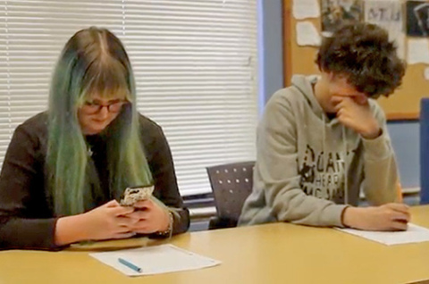 Senior Scott Bennett (not pictured) placed second for both his narrative film “Nora, Winona, and the Anomaly” and his PSA film “Your Choice” at the Nebraska video championships. Pictured at left in this screenshot from “Your Choice” is Bennett’s friend Araya Johnson who starred in the film and was one of two people named Best Actress at the video championships.
