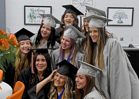 Giltner High School celebrated the graduation of the Class of 2026 Sunday afternoon with 19 graduates walking on stage to receive their diplomas. Prior to the ceremony, students from the class made a TikTok together lip syncing to “I’ll Always Remember You” from “Hannah Montana.” Pictured in front, from left: Harley Fesuluai, Gracie Kreutz, Alice Puhl. Second row: Avery Reeson, Karly Eastman, Eliana Bish, Beatrice Donati. Back Row: Litzy Ledezma and Kailyn Wilson.