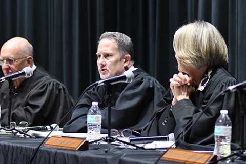 Jeff Funk, center, chief justice of the Nebraska Supreme Court, speaks in a Q&A session during last week’s Law Day at Aurora High School. 