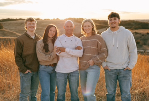 Carrie Crosby, second from right, is pictured with her family before being diagnosed with breast cancer. A golf benefit in her honor is planned for Friday at Poco Creek Golf Course.