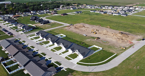 This drone photo taken last week shows the many single-family dwellings and duplexes that have been constructed in the Streeter Subdivision in the last three years. Also visible is a new street being built, which will access more lots in the recently annexed Streeter 7th Addition.