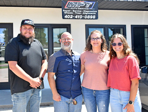 Pictured above from left are the new owners of MPT Auto Service, Tristen Evans and Colt Salmon. To Salmon’s right are his wife Jasmin and their daughter Zoe.