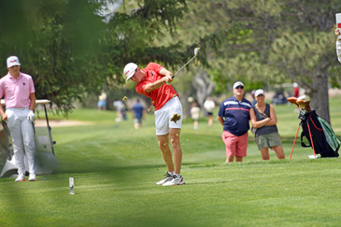 Ryan Staehr takes a chunky divot off the par-3 17th hole during Thursday’s second round of the Class B state golf tournament at Scottsbluff Country Club. Staehr turned in rounds of 86 and 88 for a two-day score of 174. 