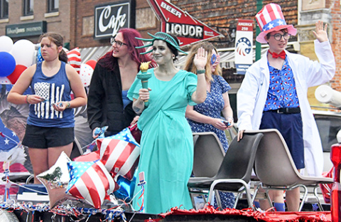 This year’s A’ROR’N Days parade featured patriotic floats. Representing Memorial Community Health on its float are from left: Kaiya Crabtree, Haidyn Scribner, Angelique Moore, Sam Sorensen and Colin Sorensen. See more A’ROR’N Days photos at auroranewsregister.com