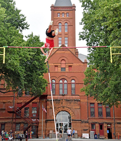 Class A state polevault champion Malakai Maly of Lincoln East won the high school division with a mark of 15 feet even.