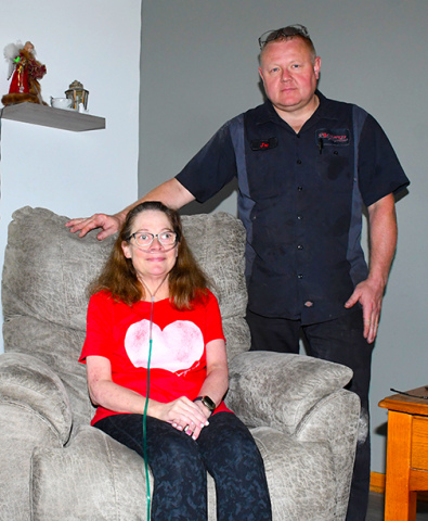 Angie Burson, pictured here at home with her husband, Joe, is on the waiting list for a double lung transplant. A benefit in her honor is planned for Aug. 8 at the fairgrounds.