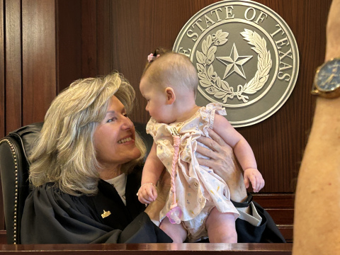 The judge shares a moment with Scottie.