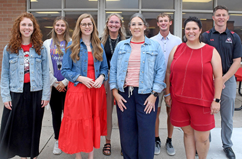 Several new members were welcomed Monday to the Aurora Public Schools staff. Pictured from left: Cacia Barnes (HS English), Paige Cellar (1st grade), Tracy Jakubowski (assistant principal/curriculum), Jaylee Wessels (resource), Tracy Eckhardt  (early childhood special education), Zane Abler (3rd grade), Andee Felber (5th grade), and Nicholas Lonowski (assistant elementary principal).