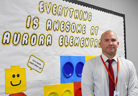 Aurora native, AHS grad and former high school assistant principal Cody Hoegh stepped into a new role this fall as principal at Aurora Elementary School.