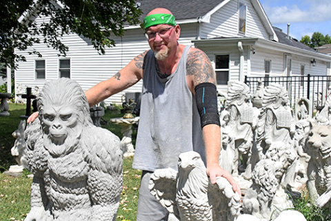 Carl Franklin is the owner and artist at Moonlight Statuary in Aurora, displaying hundreds of concrete statues in his yard, driveway and around his home at 604 K St..